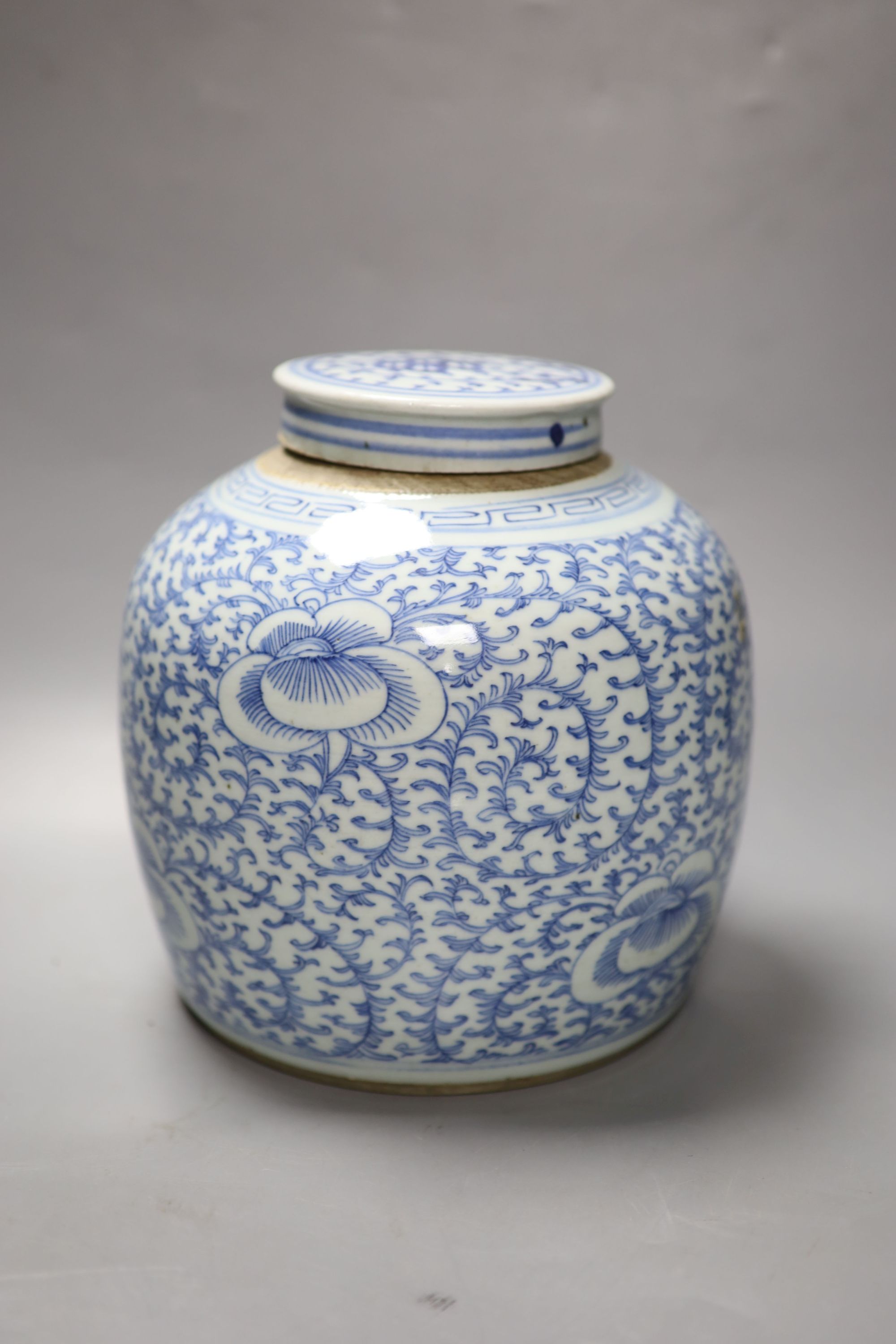 A 19th century Chinese blue and white jar, with associated cover, height 22cm